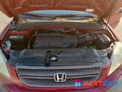 Zdjęcie 12 z 12 samochodu: 2004 HONDA PILOT EXL VIN:2HKYF18604H575661 - miniatura