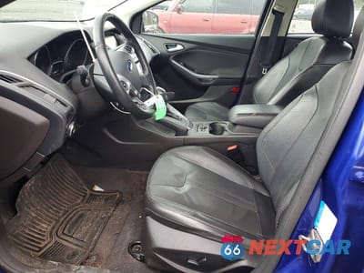 Zdjęcie 7 z 11 samochodu: 2014 FORD FOCUS TITANIUM VIN:1FADP3J20EL230468 - miniatura