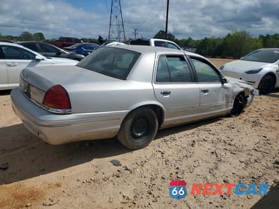 Trzecie zdjęcie samochodu z tyłu: 2000 FORD CROWN VICTORIA POLICE INTERCEPTOR VIN:2FAFP71W1YX101634 - miniatura