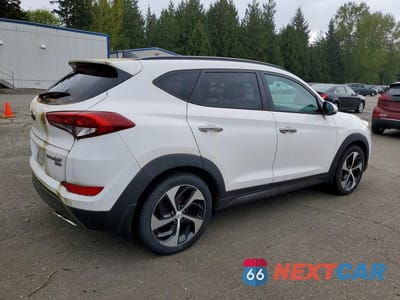 Trzecie zdjęcie samochodu z tyłu: 2016 HYUNDAI TUCSON LIMITED VIN:KM8J3CA27GU098200 - miniatura