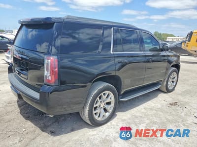 Trzecie zdjęcie samochodu z tyłu: 2020 GMC YUKON SLT VIN:1GKS1BKC1LR123139 - miniatura