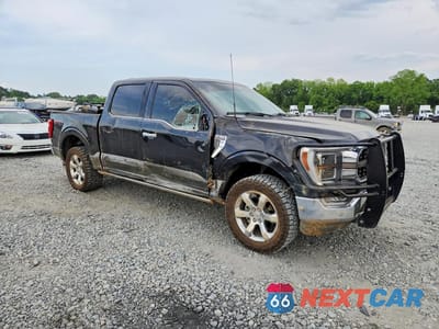 Czwarte zdjęcie samochodu z boku: 2023 FORD F150 SUPERCREW VIN:1FTFW1E87PFB47808 - miniatura
