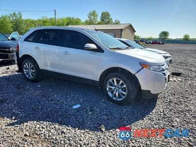 Czwarte zdjęcie samochodu z boku: 2014 FORD EDGE VIN:2FMDK3JC9EBB17440 - miniatura