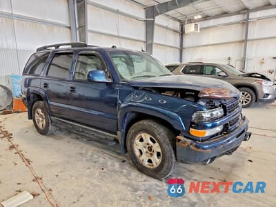 Czwarte zdjęcie samochodu z boku: 2005 CHEVROLET TAHOE K1500 VIN:1GNEK13T95R163915 - miniatura