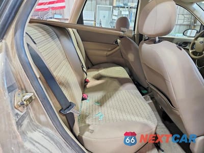 Zdjęcie 11 z 13 samochodu: 2005 FORD FOCUS ZXW VIN:1FAHP36N35W208077 - miniatura