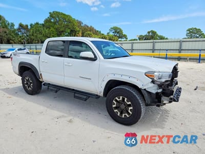 Czwarte zdjęcie samochodu z boku: 2022 TOYOTA TACOMA TRD OFF-ROAD VIN:3TMAZ5CN8NM175504 - miniatura