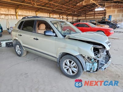 Czwarte zdjęcie samochodu z boku: 2009 HYUNDAI TUCSON GLS VIN:KM8JM12B19U989845 - miniatura