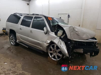 Czwarte zdjęcie samochodu z boku: 2006 GMC YUKON XL DENALI VIN:1GKFK66U06J176247 - miniatura