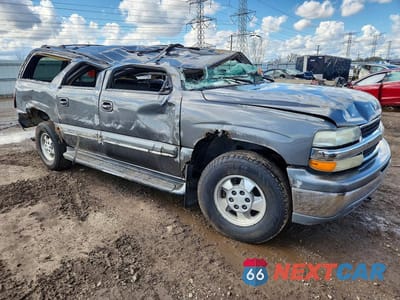 Czwarte zdjęcie samochodu z boku: 2002 CHEVROLET SUBURBAN K1500 VIN:1GNFK16Z42J294961 - miniatura