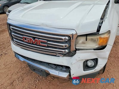 Zdjęcie 11 z 12 samochodu: 2016 GMC CANYON SLT VIN:1GTG5DE31G1127791 - miniatura