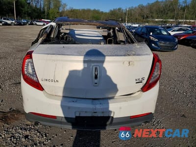 Zdjęcie 6 z 11 samochodu: 2013 LINCOLN MKS VIN:1LNHL9FT8DG612097 - miniatura