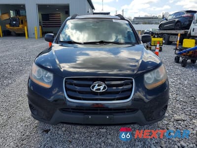 Piąte zdjęcie samochodu w środku: 2010 HYUNDAI SANTA FE GLS VIN:5NMSG3AB3AH382824 - miniatura