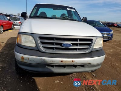 Piąte zdjęcie samochodu w środku: 2000 FORD F150 VIN:1FTZF1721YNA01398 - miniatura