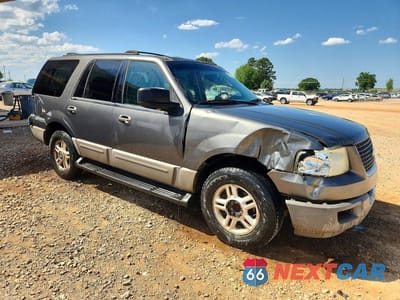 Czwarte zdjęcie samochodu z boku: 2003 FORD EXPEDITION XLT VIN:1FMPU16L33LA22616 - miniatura