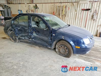 Czwarte zdjęcie samochodu z boku: 2003 VOLKSWAGEN JETTA GL VIN:3VWRK69M03M083616 - miniatura