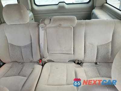 Zdjęcie 10 z 12 samochodu: 2003 CHEVROLET TAHOE C1500 VIN:1GNEC13Z03R180018 - miniatura