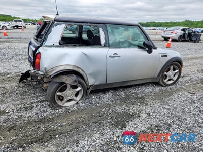 Trzecie zdjęcie samochodu z tyłu: 2002 MINI COOPER VIN:WMWRC33422TC32776 - miniatura
