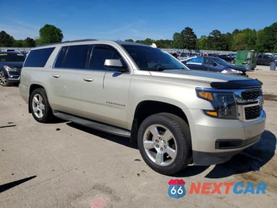 Czwarte zdjęcie samochodu z boku: 2015 CHEVROLET SUBURBAN C1500 LT VIN:1GNSCJKC5FR718815 - miniatura