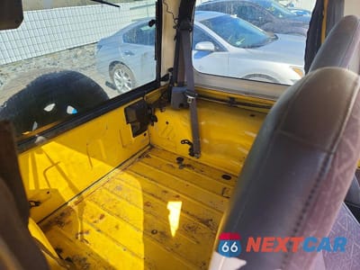 Zdjęcie 10 z 13 samochodu: 2000 JEEP WRANGLER / TJ SPORT VIN:1J4FA49S1YP712176 - miniatura