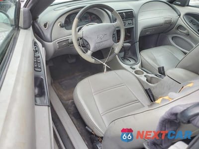 Zdjęcie 8 z 11 samochodu: 2004 FORD MUSTANG VIN:1FAFP44654F208377 - miniatura