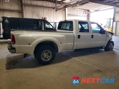 Trzecie zdjęcie samochodu z tyłu: 1999 FORD F350 SUPER DUTY VIN:1FTWW32S9XEF00535 - miniatura