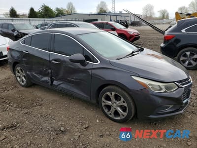 Czwarte zdjęcie samochodu z boku: 2017 CHEVROLET CRUZE PREMIER VIN:1G1BF5SM5H7103530 - miniatura