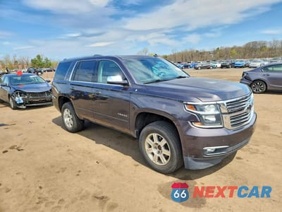 Czwarte zdjęcie samochodu z boku: 2015 CHEVROLET TAHOE K1500 LTZ VIN:1GNSKCKC9FR212161 - miniatura