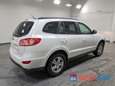 Trzecie zdjęcie samochodu z tyłu: 2012 HYUNDAI SANTA FE GLS VIN:5XYZG3AB9CG142804 - miniatura