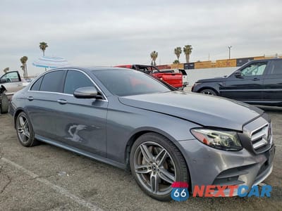 Czwarte zdjęcie samochodu z boku: 2018 MERCEDES-BENZ E 300 VIN:WDDZF4JB5JA453822 - miniatura