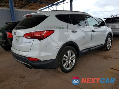 Trzecie zdjęcie samochodu z tyłu: 2014 HYUNDAI SANTA FE SPORT 2.0T VIN:5XYZU3LA9EG172983 - miniatura