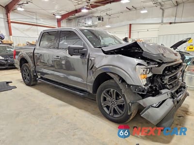 Czwarte zdjęcie samochodu z boku: 2023 FORD F150 SUPERCREW VIN:1FTEW1EP4PKE00657 - miniatura