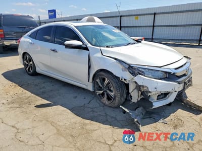 Czwarte zdjęcie samochodu z boku: 2016 HONDA CIVIC TOURING VIN:2HGFC1F94GH638224 - miniatura