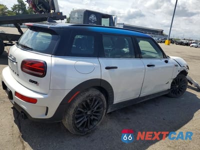 Trzecie zdjęcie samochodu z tyłu: 2024 MINI COOPER S CLUBMAN ALL4 VIN:WMWXJ1C01R2U74292 - miniatura