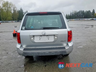 Zdjęcie 6 z 12 samochodu: 2005 HONDA PILOT LX VIN:2HKYF18105H545565 - miniatura