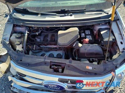 Zdjęcie 12 z 13 samochodu: 2010 FORD EDGE SE VIN:2FMDK3GC7ABB79887 - miniatura