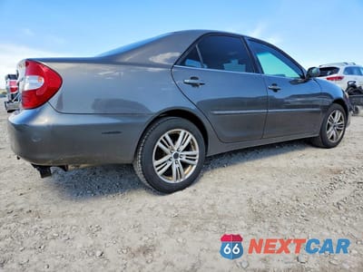 Trzecie zdjęcie samochodu z tyłu: 2003 TOYOTA CAMRY XLE V6 VIN:4T1BF30K33U546262 - miniatura