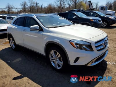 Czwarte zdjęcie samochodu z boku: 2015 MERCEDES-BENZ GLA 250 4MATIC VIN:WDCTG4GB5FJ184243 - miniatura