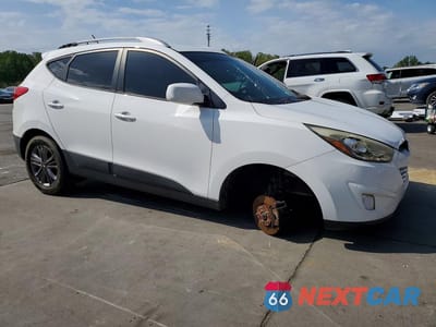 Czwarte zdjęcie samochodu z boku: 2015 HYUNDAI TUCSON SE VIN:KM8JU3AGXFU059785 - miniatura