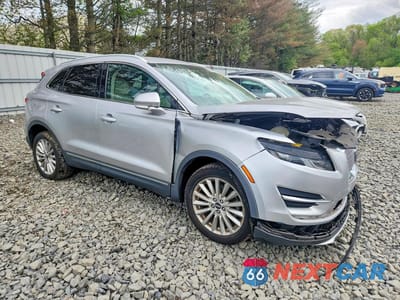 Czwarte zdjęcie samochodu z boku: 2019 LINCOLN MKC VIN:5LMCJ1C92KUL27143 - miniatura