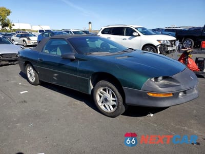 Czwarte zdjęcie samochodu z boku: 1994 CHEVROLET CAMARO Z28 VIN:2G1FP32P2R2169507 - miniatura