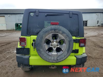 Zdjęcie 6 z 13 samochodu: 2016 JEEP WRANGLER UNLIMITED SAHARA VIN:1C4BJWEG3GL292346 - miniatura