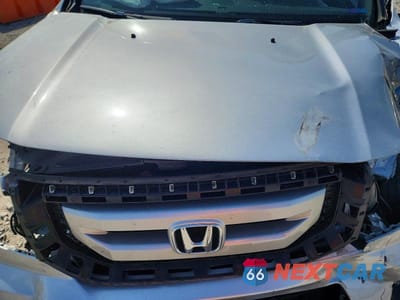 Zdjęcie 12 z 13 samochodu: 2011 HONDA PILOT TOURING VIN:5FNYF4H9XBB032454 - miniatura