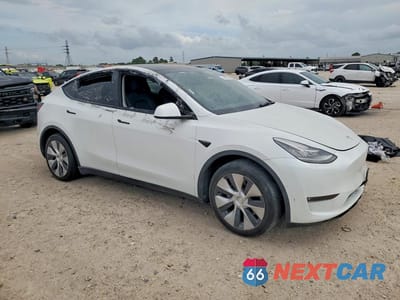 Czwarte zdjęcie samochodu z boku: 2021 TESLA MODEL Y VIN:5YJYGDEE2MF279873 - miniatura