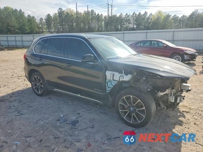 Czwarte zdjęcie samochodu z boku: 2017 BMW X5 XDR40E VIN:5UXKT0C34H0V95581 - miniatura