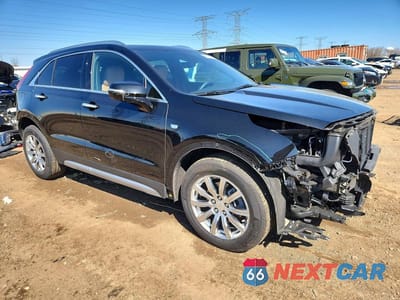 Czwarte zdjęcie samochodu z boku: 2022 CADILLAC XT4 PREMIUM LUXURY VIN:1GYFZDR43NF166508 - miniatura