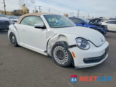 Czwarte zdjęcie samochodu z boku: 2016 VOLKSWAGEN BEETLE S VIN:3VW517AT4GM803564 - miniatura