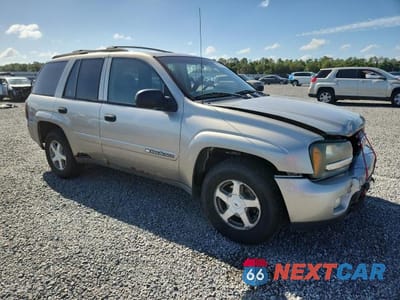 Czwarte zdjęcie samochodu z boku: 2003 CHEVROLET TRAILBLAZER VIN:1GNDT13SX32199599 - miniatura