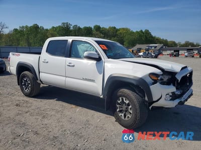 Czwarte zdjęcie samochodu z boku: 2023 TOYOTA TACOMA TRD OFF-ROAD VIN:3TMCZ5AN7PM627232 - miniatura