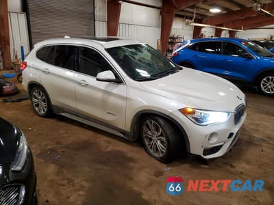 Czwarte zdjęcie samochodu z boku: 2016 BMW X1 XDRIVE28I VIN:WBXHT3C31G5E50423 - miniatura