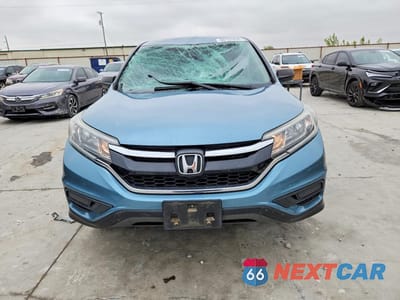 Piąte zdjęcie samochodu w środku: 2015 HONDA CR-V LX VIN:2HKRM3H33FH559887 - miniatura
